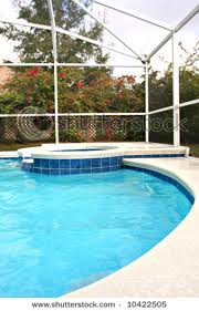 swimming pool with a hot tub extension